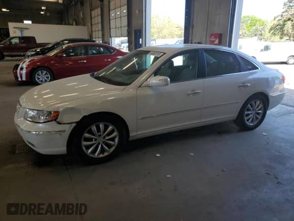 2008 Hyundai Azera Limited с VIN KMHFC46F88A290705, выставлен на аукционе Copart как лот 56882515 с пробегом 114 947 миль миль и Списание • Salvage title. История ставок и продаж доступна на DreamBid. Изображение 1.