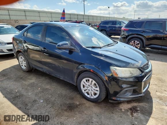 ✅ 2017 Chevrolet Sonic LS • VIN: 1G1JB5SH6H4167944 • Lot: 84769235. Listed on Copart with 89,438 mi. Free auction sales archive from the USA and detailed vehicle history report at DreamBid. Image 4.