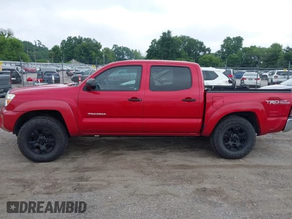 ✅ 2012 Toyota Tacoma PreRunner • VIN: 3TMJU4GN1CM128220 • Lot: 42794993. Listed on IAAI with 146,871 mi. Free auction sales archive from the USA and detailed vehicle history report at DreamBid. Image 14.