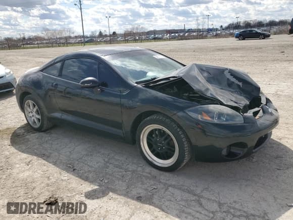 ✅ 2007 Mitsubishi Eclipse SE • VIN: 4A3AK64F07E072195 • Lot: 50631275. Listed on Copart with 159,896 mi. Free auction sales archive from the USA and detailed vehicle history report at DreamBid. Image 4.