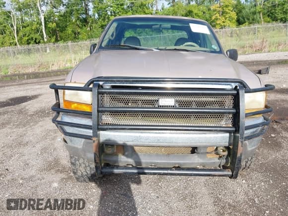 ✅ 1999 Ford F-250 XL • VIN: 1FTNW21F9XEB73659 • Lot: 42793384. Listed on IAAI with 360,335 mi. Free auction sales archive from the USA and detailed vehicle history report at DreamBid. Image 14.