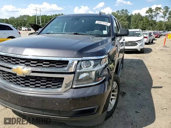 2018 Chevrolet Suburban LS с VIN 1GNSCGKC9JR153299, выставлен на аукционе Copart как лот 84071755 с пробегом 174 503 миль миль и Списание • Salvage title. История ставок и продаж доступна на DreamBid. Изображение 14.