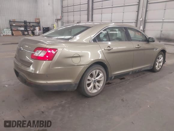 ✅ 2012 Ford Taurus SEL • VIN: 1FAHP2EW0CG114749 • Lot: 43311085. Listed on IAAI with 180,749 mi. Free auction sales archive from the USA and detailed vehicle history report at DreamBid. Image 4.