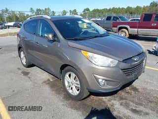 2013 Hyundai Tucson GLS with VIN KM8JUCAC5DU714171, listed as a IAAI auction lot 43432217 with 159,367 mi miles and . Bid and sale history available at DreamBid. Image 1.