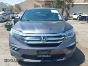 ✅ 2016 Honda Pilot EX-L • VIN: 5FNYF5H7XGB060234 • Lot: 43194968. Listed on IAAI with 130,758 mi. Free auction sales archive from the USA and detailed vehicle history report at DreamBid. Image 12.