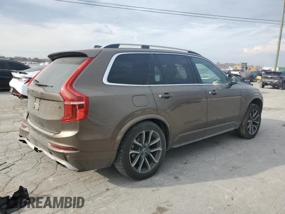 ✅ 2017 Volvo XC90 Momentum • VIN: YV4A22PK0H1117467 • Lot: 93540765. Listed on Copart with 182,886 mi. Free auction sales archive from the USA and detailed vehicle history report at DreamBid. Image 3.