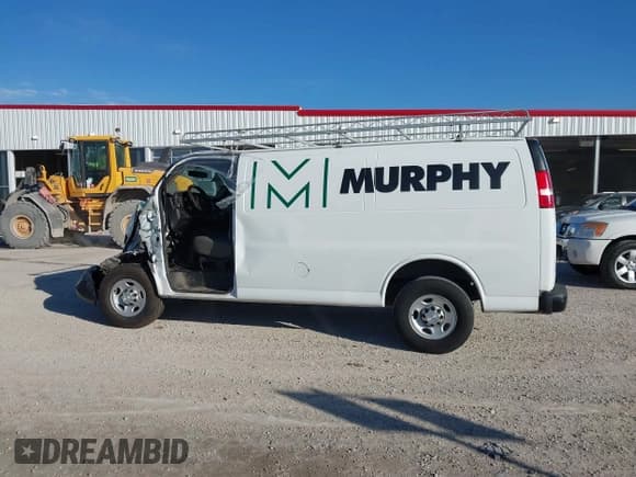 ✅ 2015 Chevrolet Express Cargo • VIN: 1GCZGTCG0F1280261 • Lot: 41077406. Listed on IAAI with 176,460 mi. Free auction sales archive from the USA and detailed vehicle history report at DreamBid. Image 14.