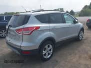 ✅ 2014 Ford Escape SE • VIN: 1FMCU9GX3EUB83978 • Lot: 42509549. Listed on IAAI with 121,388 mi. Free auction sales archive from the USA and detailed vehicle history report at DreamBid. Image 4.
