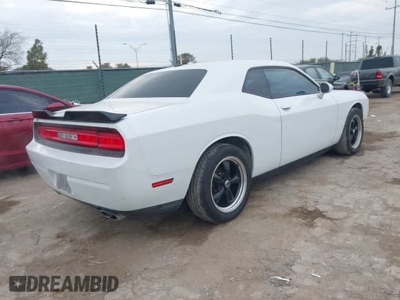 ✅ 2013 Dodge Challenger SXT • VIN: 2C3CDYAG5DH510975 • Lot: 43859745. Listed on IAAI with 150,268 mi. Free auction sales archive from the USA and detailed vehicle history report at DreamBid. Image 4.