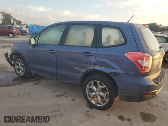 2014 Subaru Forester 2.5i with VIN JF2SJAAC7EH440621, listed as a Copart auction lot 86054055 with 161,684 mi miles and Salvage title. Bid and sale history available at DreamBid. Image 2.
