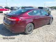 ✅ 2017 Ford Fusion Titanium • VIN: 3FA6P0SU7HR197028 • Lot: 43095971. Wystawiony na IAAI z przebiegiem 127 908 mil. Bezpłatny archiwum sprzedaży aukcyjnych z USA i szczegółowy raport historii pojazdu na DreamBid. Zdjęcie 4.