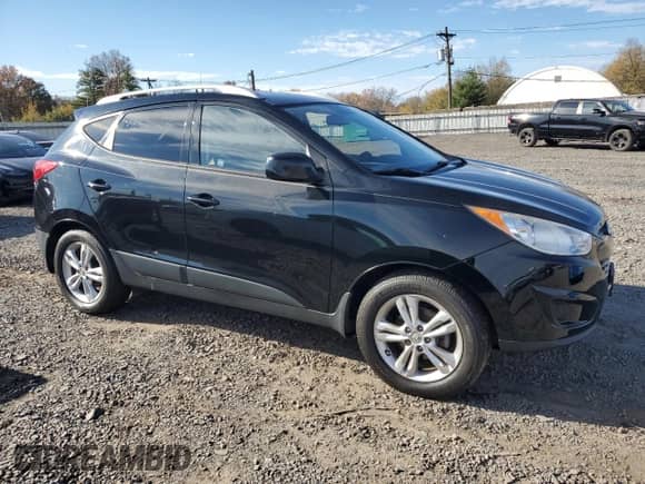 2011 Hyundai Tucson GLS z VIN KM8JU3AC5BU243989, wystawiony jako Copart lot #91693925 z przebiegiem 151 662 mil mil oraz Czysty tytuł • Clean title. Historia ofert i sprzedaży dostępna na DreamBid. Obrazek 4.