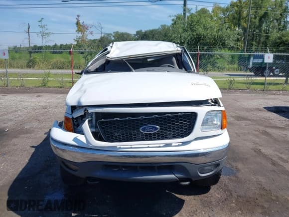✅ 1999 Ford F-150 • VIN: 2FTRX08W0XCA56180 • Lot: 42865592. Listed on IAAI with 203,986 mi. Free auction sales archive from the USA and detailed vehicle history report at DreamBid. Image 12.