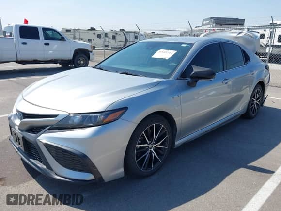 2021 Toyota Camry Hybrid SE z VIN 4T1G31AKXMU562641, wystawiony jako IAAI lot #42415712 z przebiegiem 71 085 mil mil oraz . Historia ofert i sprzedaży dostępna na DreamBid. Obrazek 19.