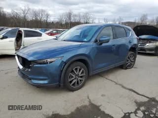 ✅ 2018 Mazda CX-5 Grand Touring • VIN: JM3KFBDM8J0327187 • Lot: 92406505. Listed on Copart with 58,323 mi. Free auction sales archive from the USA and detailed vehicle history report at DreamBid. Image 1.
