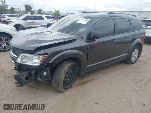 2017 Dodge Journey SE with VIN 3C4PDCAB2HT636910, listed as a IAAI auction lot 43095502 with 173,852 mi miles and . Bid and sale history available at DreamBid. Image 17.