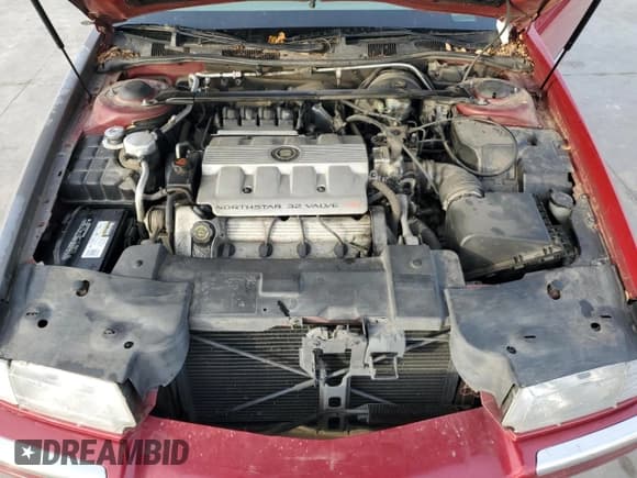 ✅ 1998 Cadillac Eldorado Touring • VIN: 1G6ET1291WU601906 • Лот: 84911624. Опубликован ранее на Copart с пробегом 84 489 миль. Бесплатный доступ к архиву аукционных продаж из США и подробный отчёт об истории автомобиля на DreamBid. Изображение 11.