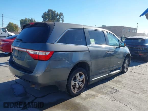 ✅ 2011 Honda Odyssey Touring • VIN: 5FNRL5H98BB063513 • Lot: 43599881. Listed on IAAI with 125,920 mi. Free auction sales archive from the USA and detailed vehicle history report at DreamBid. Image 4.