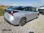 2021 Toyota Prius L Eco with VIN JTDKAMFU1M3150517, listed as a Copart auction lot 70697765 with 107,800 mi miles and Salvage title. Bid and sale history available at DreamBid. Image 3.