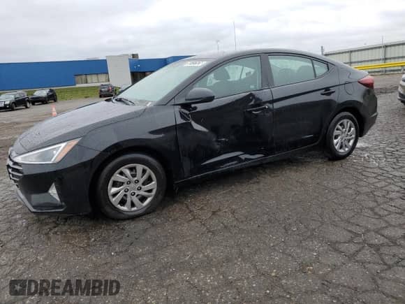 2020 Hyundai Elantra SE z VIN KMHD74LF0LU965079, wystawiony jako Copart lot #90737525 z przebiegiem 125 870 mil mil oraz Czysty tytuł • Clean title. Historia ofert i sprzedaży dostępna na DreamBid. Obrazek 1.