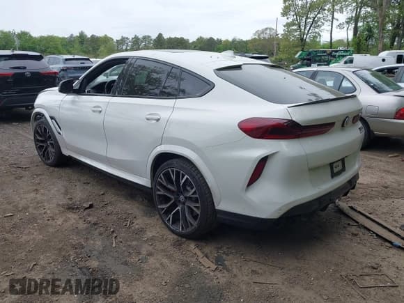 ✅ 2023 BMW X6 M • VIN: 5YMCY0C01P9R18239 • Lot: 42243183. Listed on IAAI with 23,689 mi. Free auction sales archive from the USA and detailed vehicle history report at DreamBid. Image 3.