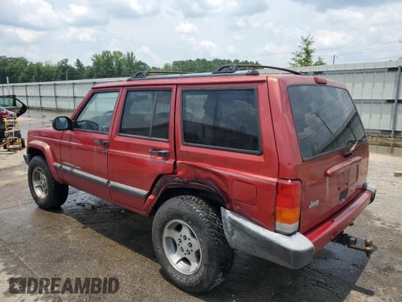 ✅ 1999 Jeep Cherokee Sport • VIN: 1J4FT68SXXL669549 • Lot: 62367015. Listed on Copart with 194,446 mi. Free auction sales archive from the USA and detailed vehicle history report at DreamBid. Image 2.