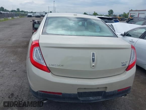 ✅ 2014 Lincoln MKS • VIN: 1LNHL9EK3EG602023 • Лот: 42830966. Опубликован ранее на IAAI с пробегом 91 033 миль. Бесплатный доступ к архиву аукционных продаж из США и подробный отчёт об истории автомобиля на DreamBid. Изображение 16.