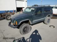✅ 1999 Jeep Cherokee Sport • VIN: 1J4FF67S9XL655246 • Лот: 71818795. Опубликован ранее на Copart с пробегом 182 228 миль. Бесплатный доступ к архиву аукционных продаж из США и подробный отчёт об истории автомобиля на DreamBid. Изображение 1.