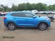 2018 Hyundai Tucson SE z VIN KM8J2CA42JU652027, wystawiony jako IAAI lot #43194087 z przebiegiem 105 824 mil mil oraz . Historia ofert i sprzedaży dostępna na DreamBid. Obrazek 13.