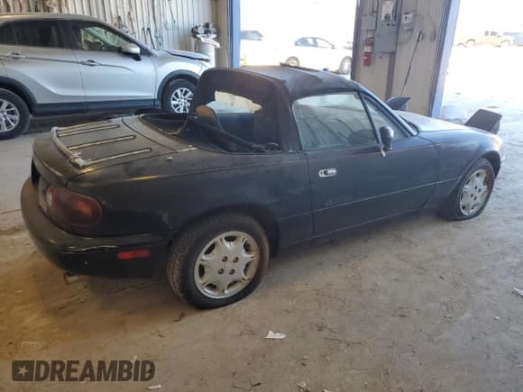 ✅ 1997 Mazda MX-5 Miata • VIN: JM1NA3536V0723334 • Lot: 79363324. Wystawiony na Copart z przebiegiem 94 099 mil. Bezpłatny archiwum sprzedaży aukcyjnych z USA i szczegółowy raport historii pojazdu na DreamBid. Zdjęcie 3.