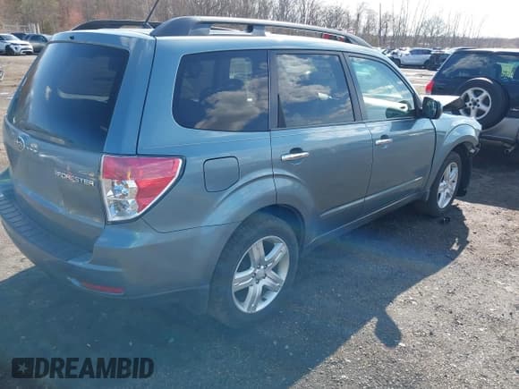 ✅ 2009 Subaru Forester X • VIN: JF2SH63669H718186 • Lot: 41869293. Listed on IAAI with 122,445 mi. Free auction sales archive from the USA and detailed vehicle history report at DreamBid. Image 4.
