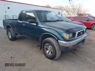 ✅ 1997 Toyota Tacoma • VIN: 4TAWN72NXVZ260613 • Lot: 43695742. Listed on IAAI with 215,782 mi. Free auction sales archive from the USA and detailed vehicle history report at DreamBid. Image 1.
