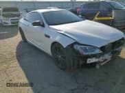 ✅ 2015 BMW M6 • VIN: WBSLX9C51FD160757 • Lot: 51991315. Listed on Copart with 71,133 mi. Free auction sales archive from the USA and detailed vehicle history report at DreamBid. Image 11.