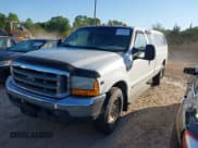 ✅ 1999 Ford F-250 XL • VIN: 1FTNX20L5XEC55084 • Lot: 42050064. Listed on IAAI with 135,884 mi. Free auction sales archive from the USA and detailed vehicle history report at DreamBid. Image 2.