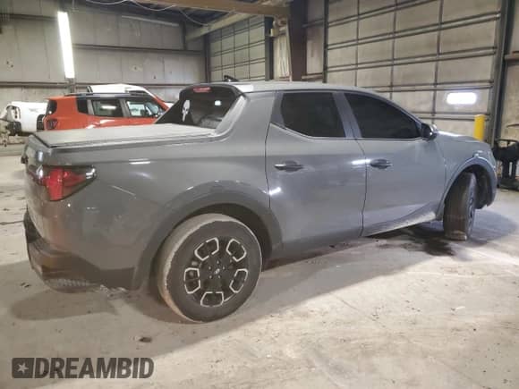 2022 Hyundai Santa Cruz SEL с VIN 5NTJB4AEXNH005539, выставлен на аукционе Copart как лот 85541234 с пробегом 30 954 миль миль и Списание • Salvage title. История ставок и продаж доступна на DreamBid. Изображение 3.
