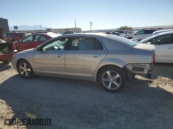 ✅ 2012 Chevrolet Malibu 1LT • VIN: 1G1ZC5E09CF214788 • Lot: 77371204. Listed on Copart with 143,302 mi. Free auction sales archive from the USA and detailed vehicle history report at DreamBid. Image 2.