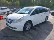 ✅ 2012 Honda Odyssey Touring • VIN: 5FNRL5H91CB143284 • Lot: 43533000. Listed on IAAI with 145,181 mi. Free auction sales archive from the USA and detailed vehicle history report at DreamBid. Image 18.