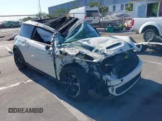 2013 MINI Hardtop S with VIN WMWSV3C54DT390038, listed as a IAAI auction lot 40169329 with 81,349 mi miles and . Bid and sale history available at DreamBid. Image 1.