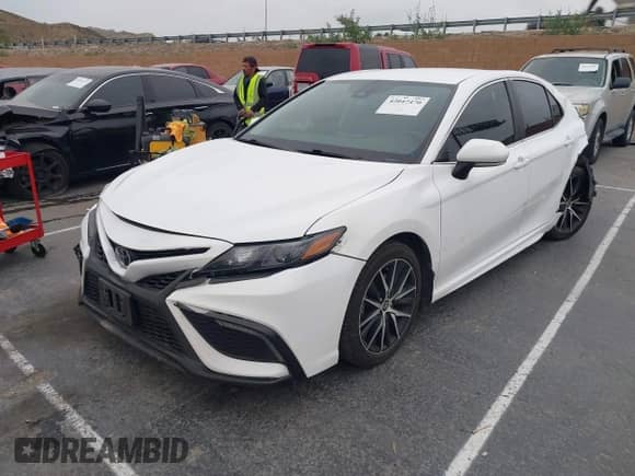 2023 Toyota Camry SE with VIN 4T1T11BK1PU077750, listed as a IAAI auction lot 42047470 with 51,015 mi miles and . Bid and sale history available at DreamBid. Image 2.