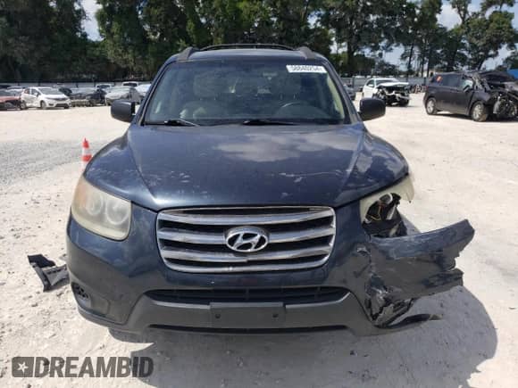 2012 Hyundai Santa Fe GLS с VIN 5XYZG3AB6CG161309, выставлен на аукционе Copart как лот 58840254 с пробегом 220 493 миль миль и Списание • Salvage title. История ставок и продаж доступна на DreamBid. Изображение 5.