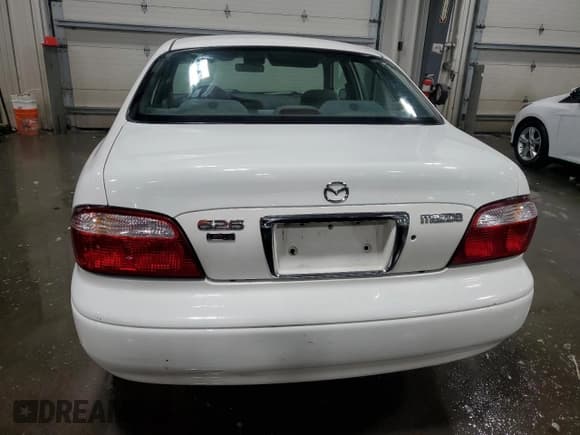 ✅ 2001 Mazda 626 LX • VIN: 1YVGF22C515228204 • Lot: 44416185. Listed on Copart with 127,230 mi. Free auction sales archive from the USA and detailed vehicle history report at DreamBid. Image 6.