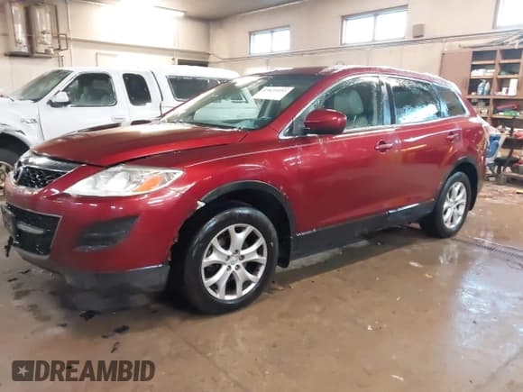 ✅ 2011 Mazda CX-9 Touring • VIN: JM3TB3CAXB0316240 • Lot: 43829499. Listed on IAAI with 140,814 mi. Free auction sales archive from the USA and detailed vehicle history report at DreamBid. Image 2.