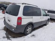 ✅ 2002 Pontiac Montana • VIN: 1GMDU03E92D197920 • Lot: 41274256. Listed on IAAI with 99,499 mi. Free auction sales archive from the USA and detailed vehicle history report at DreamBid. Image 4.