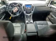 ✅ 2016 Cadillac SRX • VIN: 3GYFNAE31GS575354 • Lot: 64786435. Wystawiony na Copart z przebiegiem 176 079 mil. Bezpłatny archiwum sprzedaży aukcyjnych z USA i szczegółowy raport historii pojazdu na DreamBid. Zdjęcie 8.