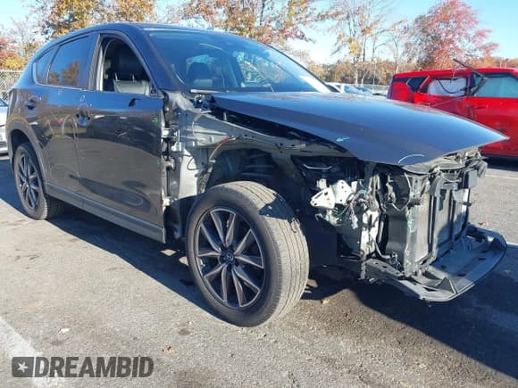 ✅ 2018 Mazda CX-5 Touring • VIN: JM3KFBCM1J1388294 • Лот: 43473583. Опубликован ранее на IAAI с пробегом 126 269 миль. Бесплатный доступ к архиву аукционных продаж из США и подробный отчёт об истории автомобиля на DreamBid. Изображение 1.