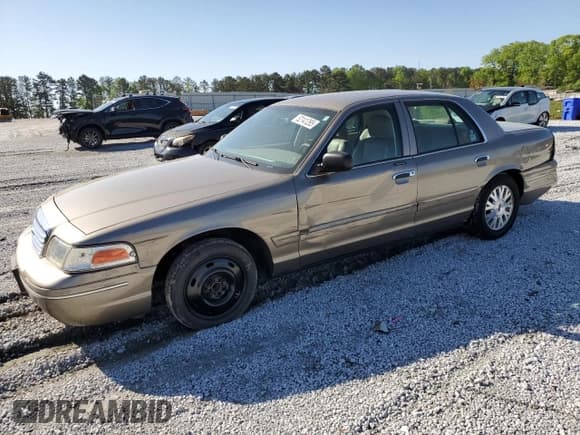 ✅ 2005 Ford Crown Victoria LX • VIN: 2FAFP74WX5X166506 • Lot: 52141265. Listed on Copart with 117,686 mi. Free auction sales archive from the USA and detailed vehicle history report at DreamBid. Image 1.