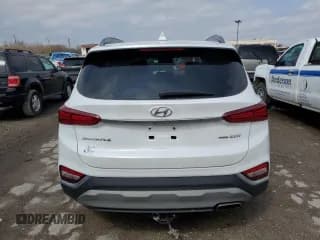 ✅ 2019 Hyundai Santa Fe Ultimate • VIN: 5NMS5CAAXKH013277 • Lot: 46651643. Wystawiony na Copart z przebiegiem 86 244 mil. Bezpłatny archiwum sprzedaży aukcyjnych z USA i szczegółowy raport historii pojazdu na DreamBid. Zdjęcie 6.