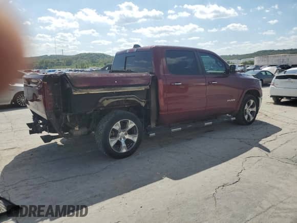 2020 Ram 1500 Laramie с VIN 1C6SRFJT7LN149174, выставлен на аукционе Copart как лот 80811405 с пробегом 111 056 миль миль и Списание • Salvage title. История ставок и продаж доступна на DreamBid. Изображение 3.