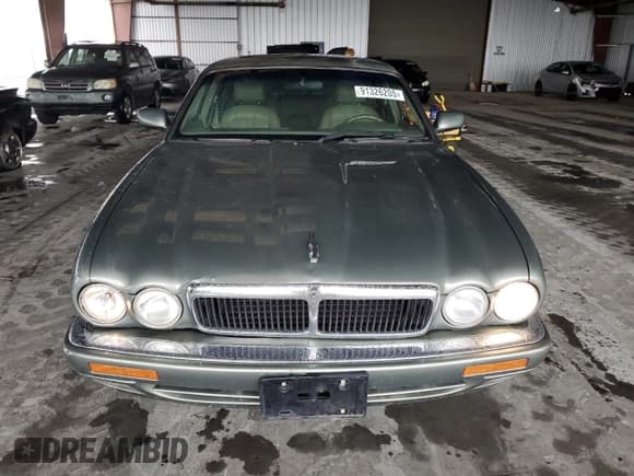 ✅ 1997 Jaguar XJ • VIN: SAJHX6248VC807875 • Лот: 91326205. Опубликован ранее на Copart с пробегом 111 202 миль. Бесплатный доступ к архиву аукционных продаж из США и подробный отчёт об истории автомобиля на DreamBid. Изображение 5.