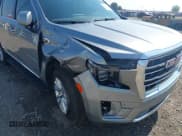 ✅ 2023 GMC Yukon SLT • VIN: 1GKS2BKD9PR210427 • Lot: 42472635. Wystawiony na IAAI z przebiegiem 24 551 mil. Bezpłatny archiwum sprzedaży aukcyjnych z USA i szczegółowy raport historii pojazdu na DreamBid. Zdjęcie 6.